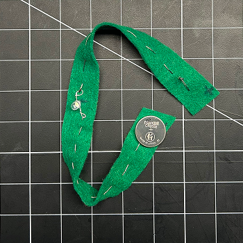 This photo shows how I positioned the battery. The negative side of the battery touches the front of the bracelet's negative side and the positive side of the battery touches the back of the bracelet's positive side.