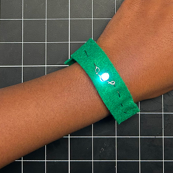 This is the bracelet being worn and lit up.