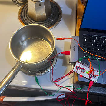 I experimented with creating a button using the action of placing and picking up a pot.