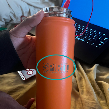 I tested this water bottle. I was curious if the metal part of the logo would still be conductive. It was.